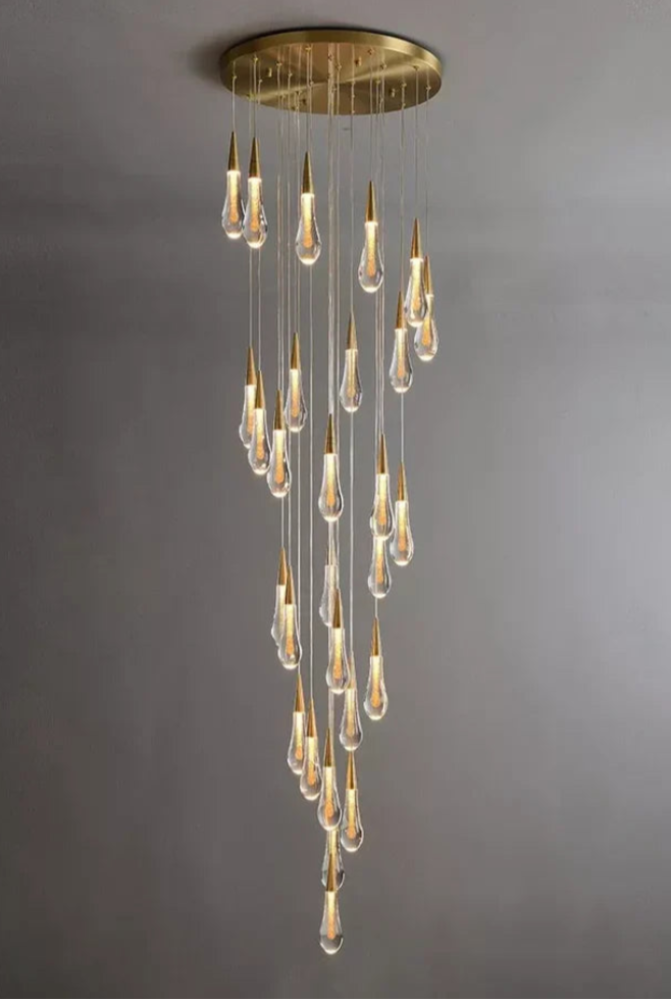 Modern chandelier with multiple light bulbs on a gray background