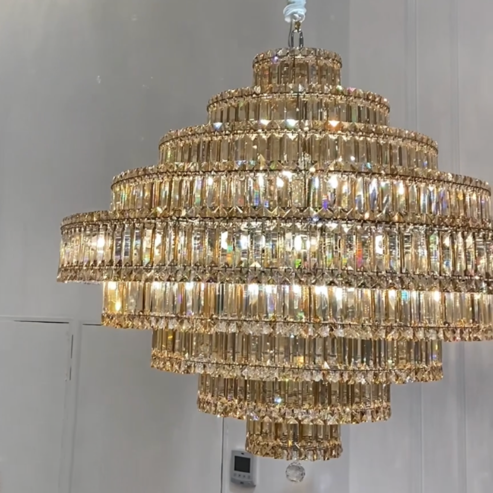 Crystal chandelier hanging against a neutral background