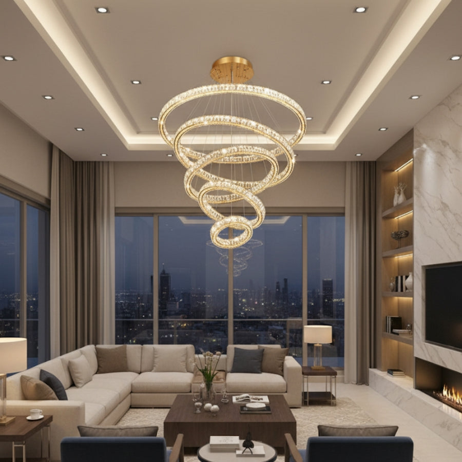Modern living room with a stylish chandelier, sectional sofa, and cityscape view.