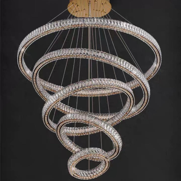 Chandelier with multiple circular crystal designs on a black background
