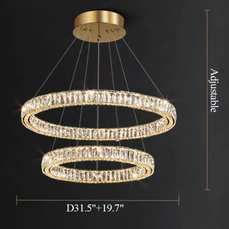 Gold chandelier with two circular rings on a black background