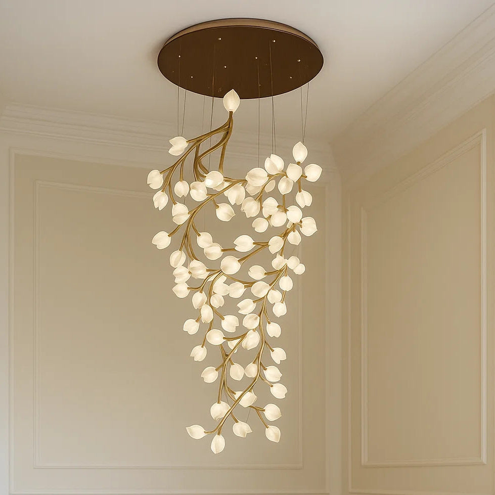 Chandelier hanging from a ceiling in a room with beige walls.