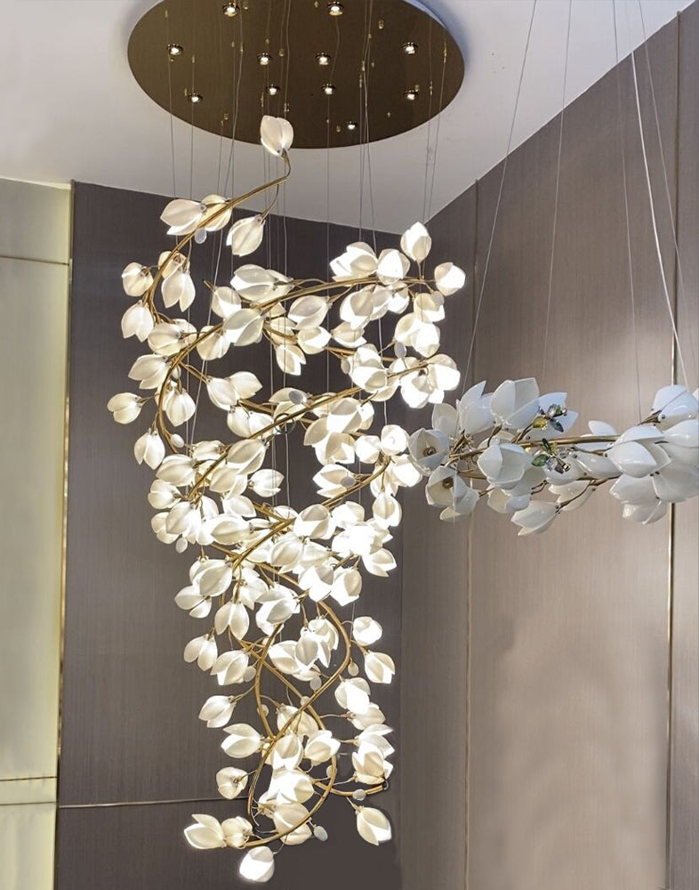 Modern chandelier with white floral design on a ceiling