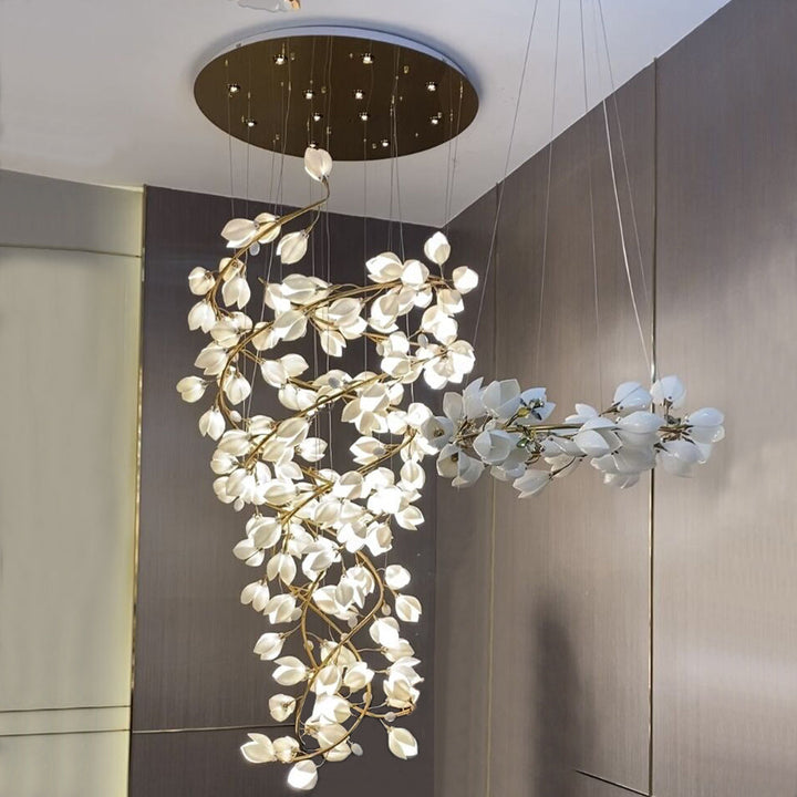 Modern chandelier with white floral design on a neutral background