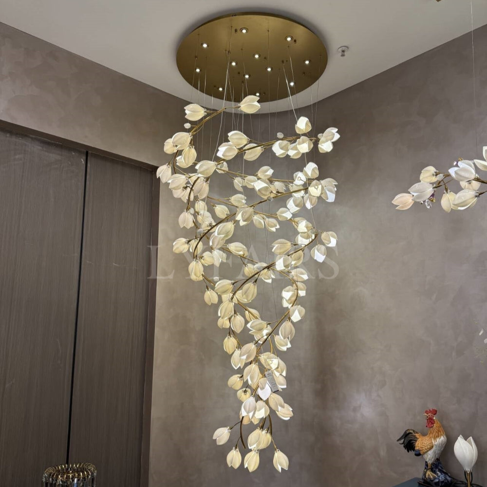 Modern chandelier with leaf-like design in a room setting