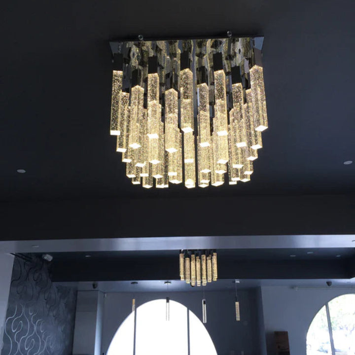 Chandelier hanging from a ceiling in an indoor setting